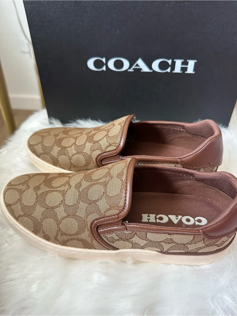 Coach woman’s Brown Signature Slip-On Sneakers
